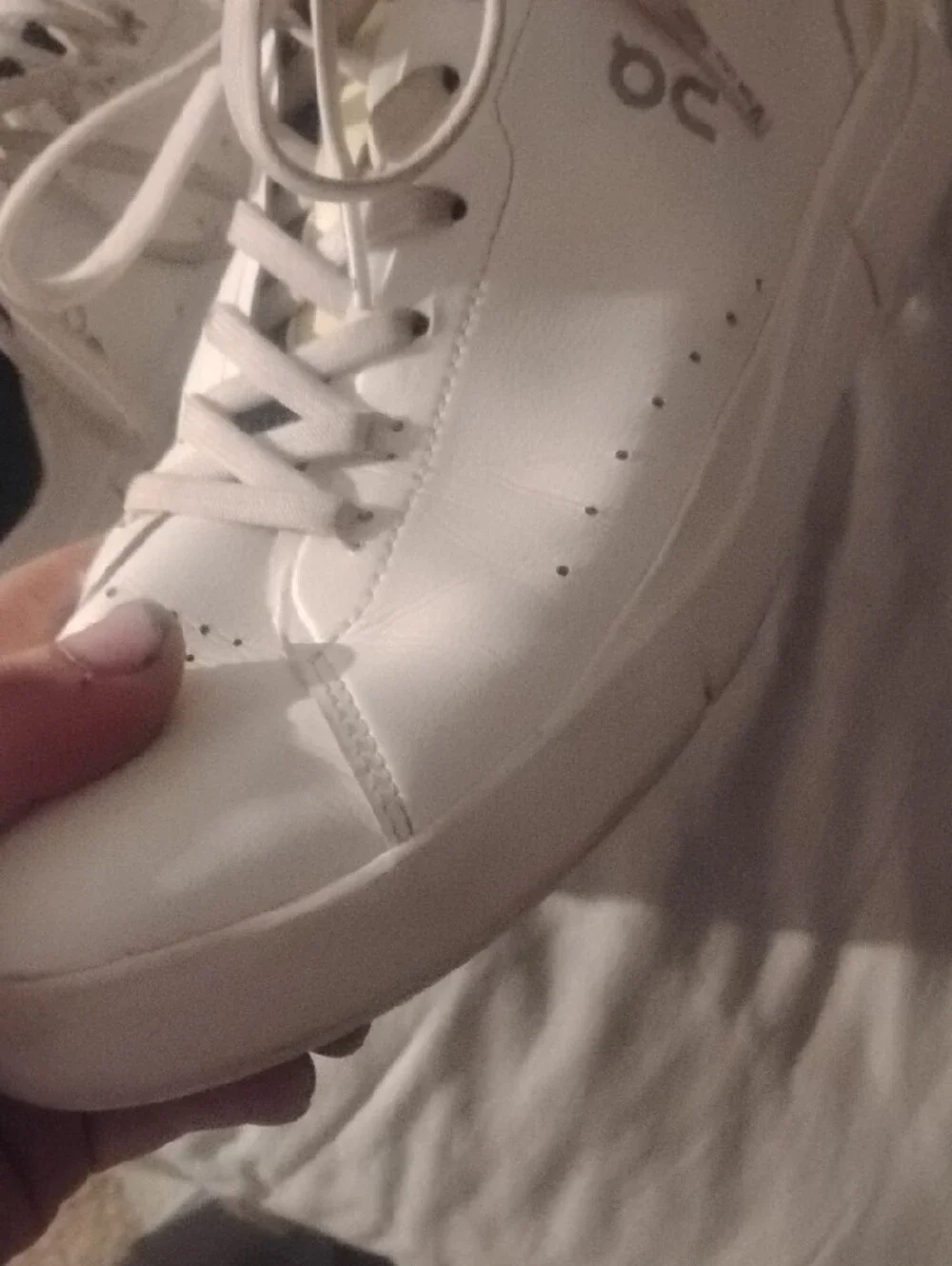 On Running The Roger Navy And White With Yellow Accents Size 11.5